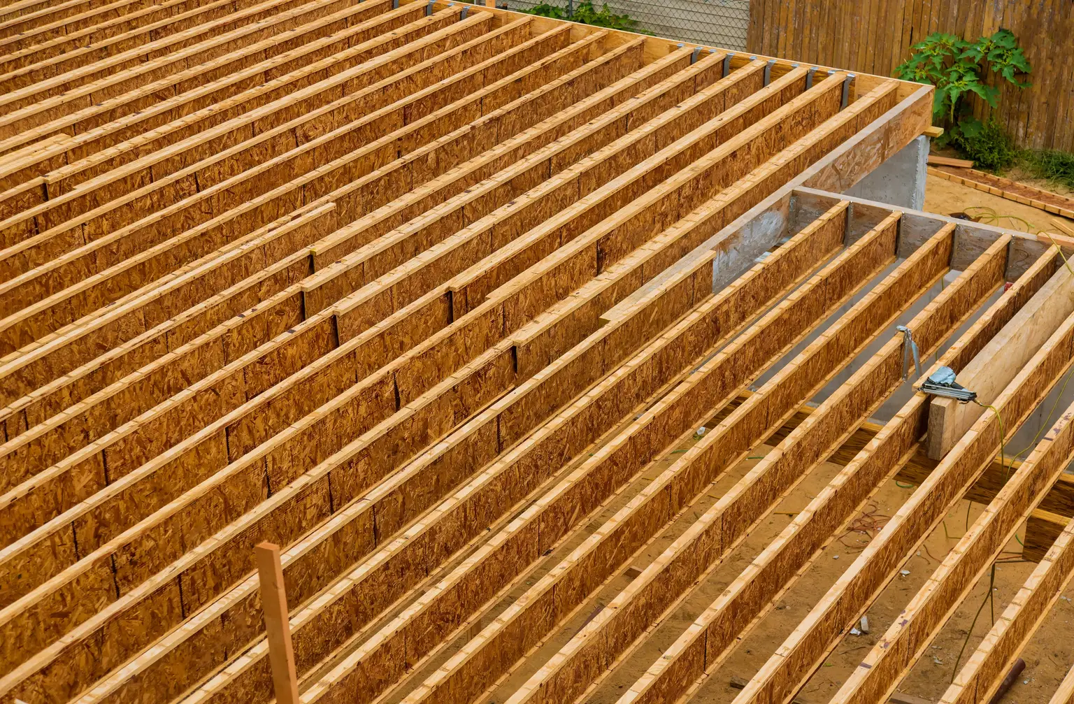 Wood floor joists installed for a home addition