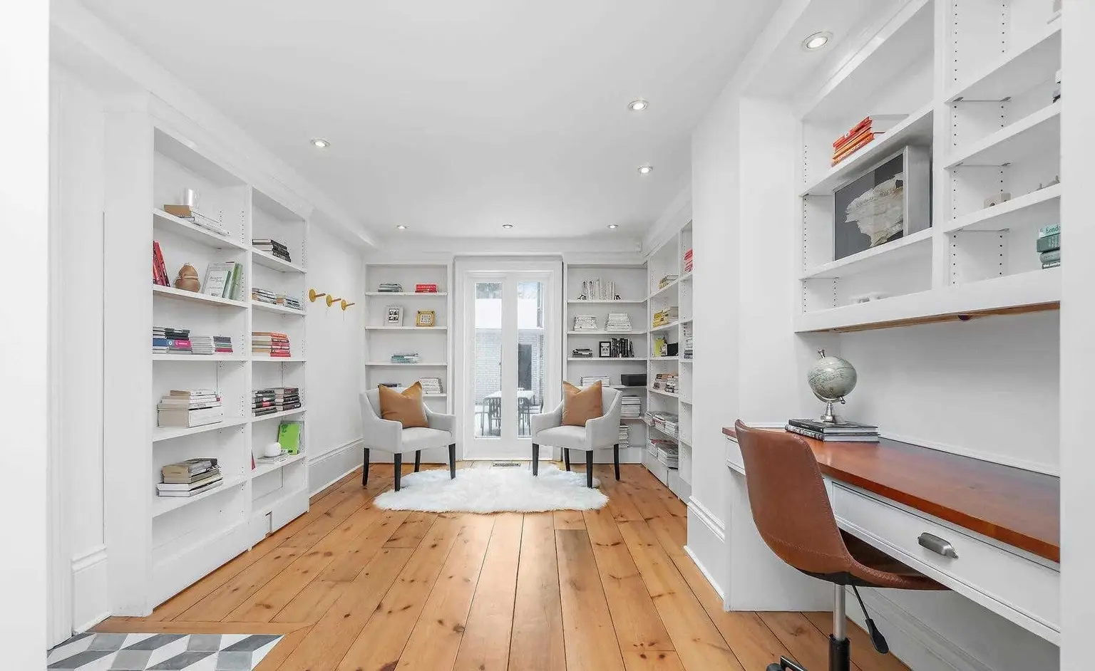Home office with built-in shelving