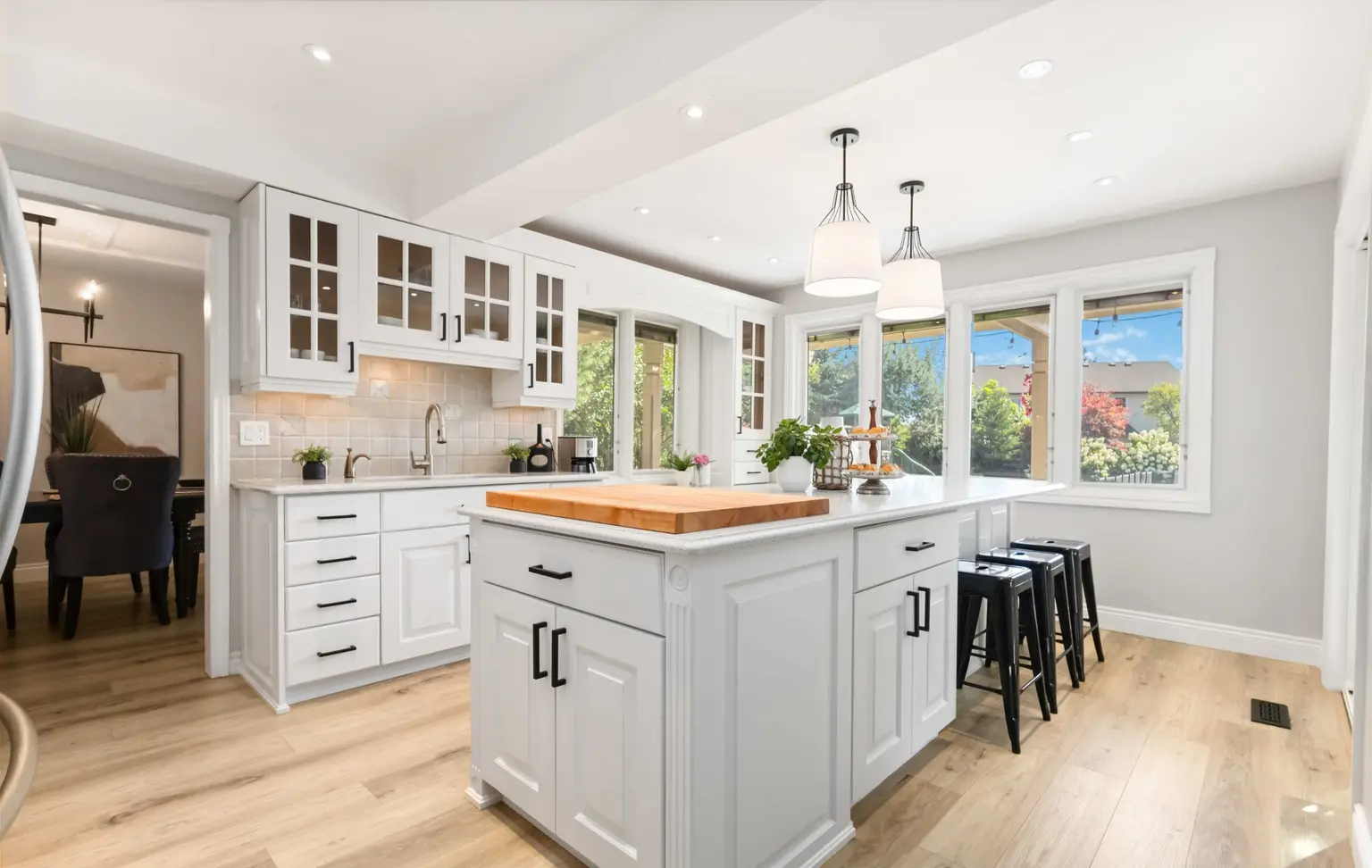 White kitchen with a butcher-block island