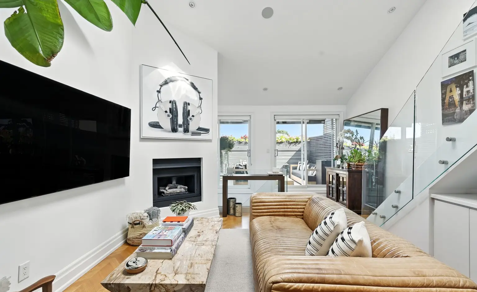 Living room beneath a staircase
