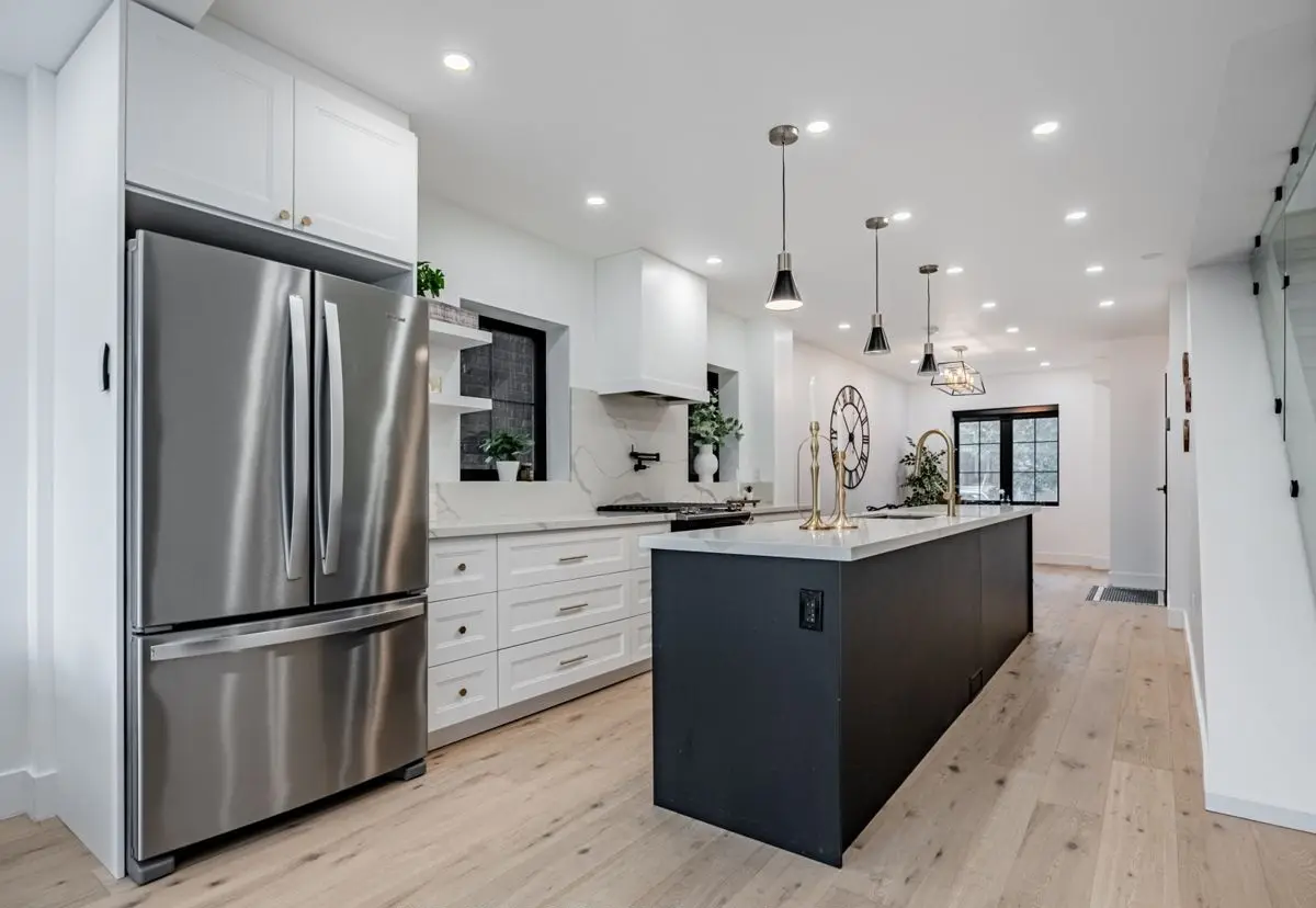 Kitchen with a stainless fridge