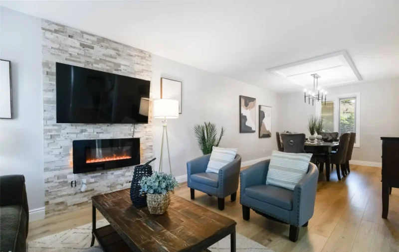 Living and dining space with a feature fireplace