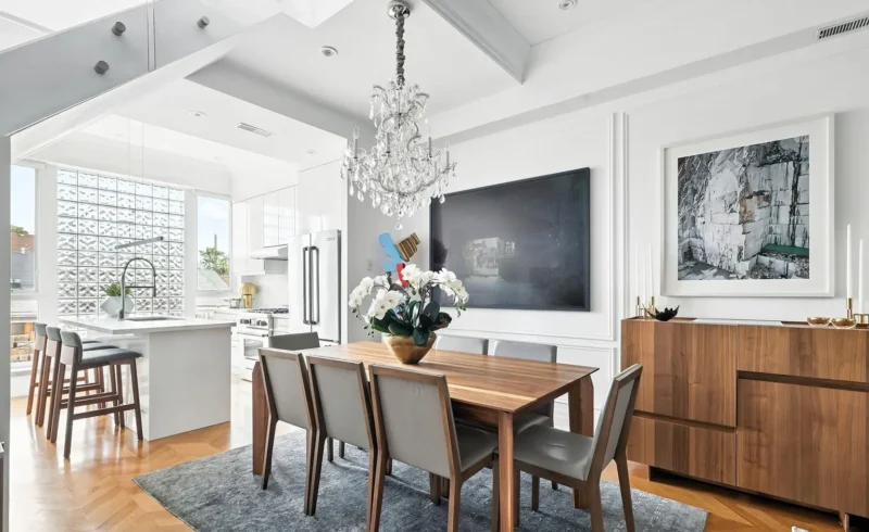Kitchen and dining area with a chandelier