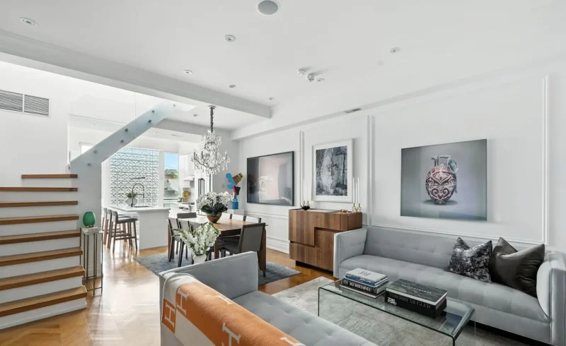 Living room with an open staircase
