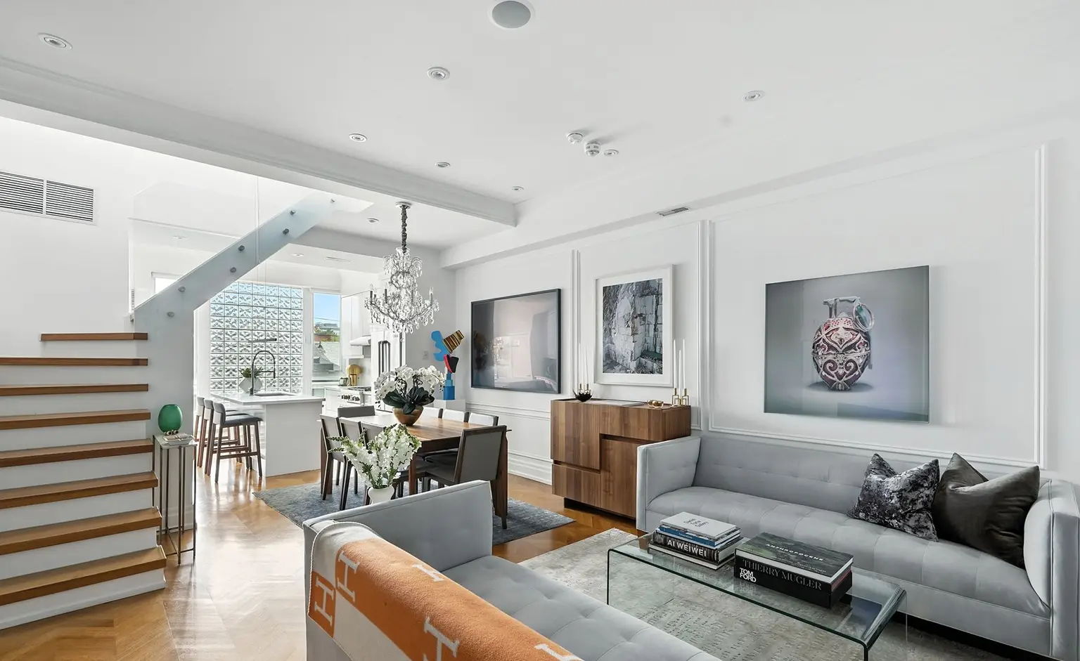 Living room with an open staircase